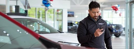 Salesperson looking at tablet