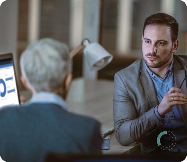 man talking to car dealer