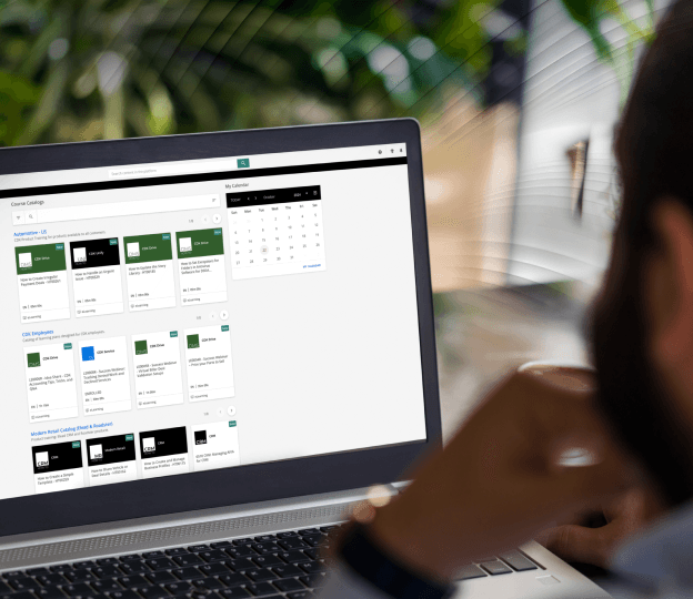 Person looking at computer screen showing applications